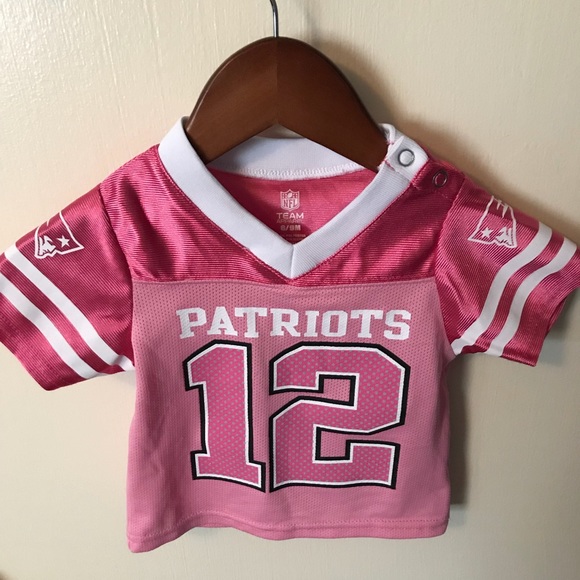 pink and white patriots jersey
